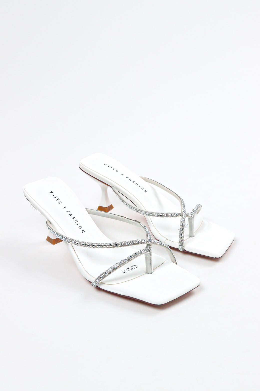 White women's strap heels