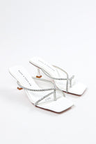White women's strap heels