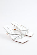 White women's strap heels